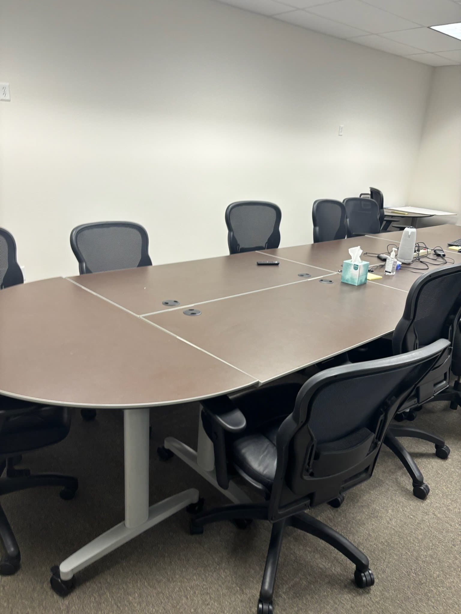Clean commercial conference room maintained by Horton Enterprise